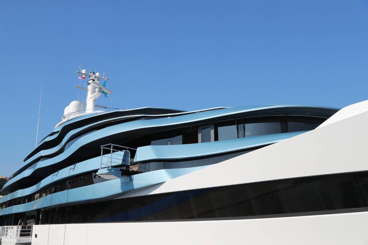 Sleek Superyacht With Blue Sky | Praxis